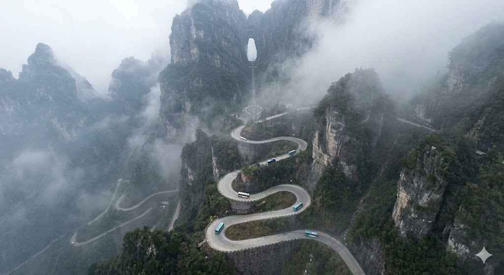 Aerial view of the 99 sharp hairpin bends on the perilous Tianmen Mountain winding road in China.